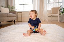 Load image into Gallery viewer, Manhattan Toys: Atom Colorpop Activity Toy - The Sensory Studio