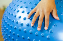 Load image into Gallery viewer, Bouncyband Sensory Peanut Ball: Blue - The Sensory Studio