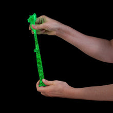 Load image into Gallery viewer, Smoosho's Super Squeeze Fidget: Stretchy Dino Glow in the Dark