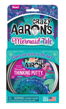 Load image into Gallery viewer, Crazy Aaron&#39;s Thinking Putty: Mermaid Tale Glow In The Dark - 10cm Tin